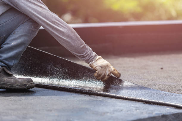Professional Basement Waterproofing technician working in Van Dyne, WI